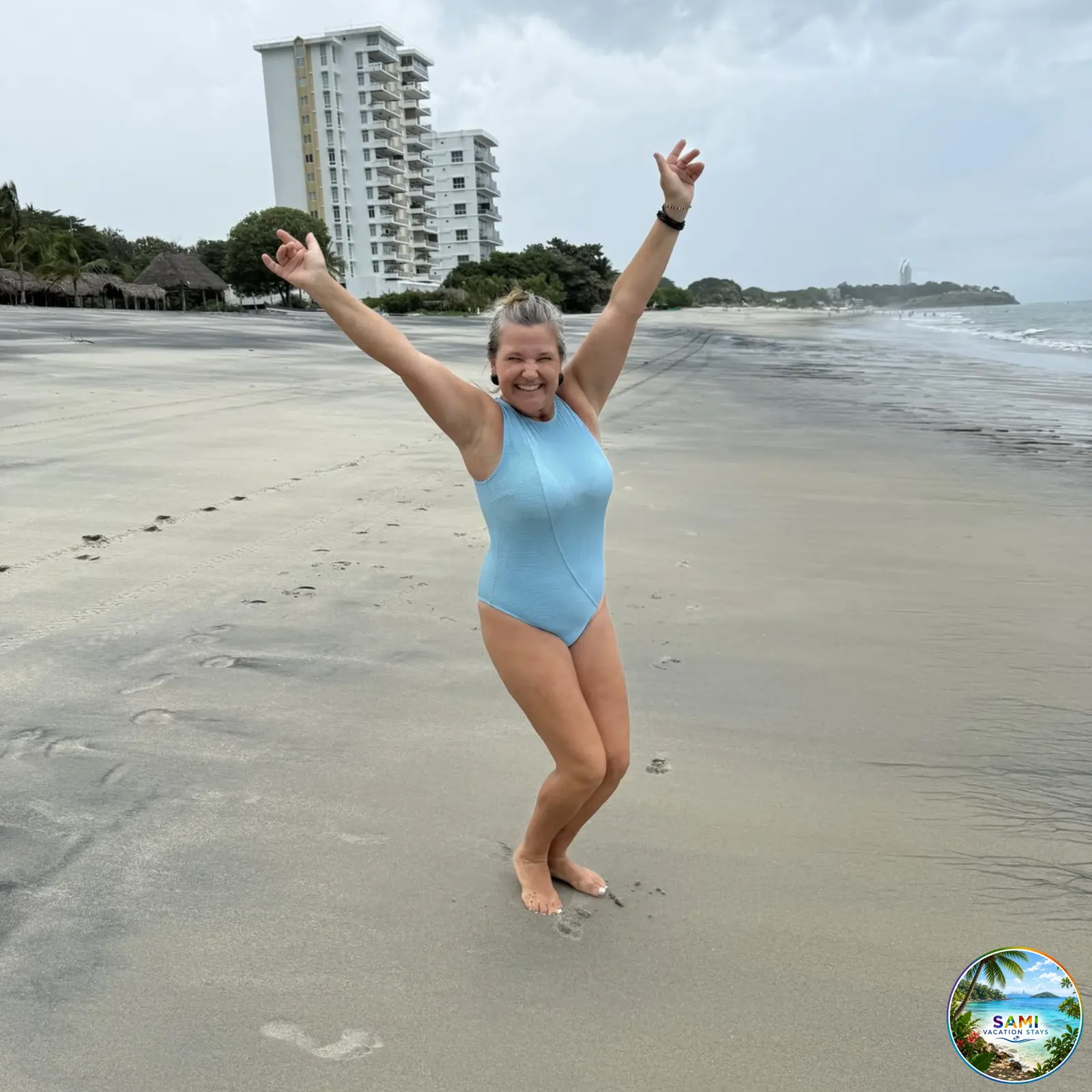 Cheerful woman enjoying a resort beach