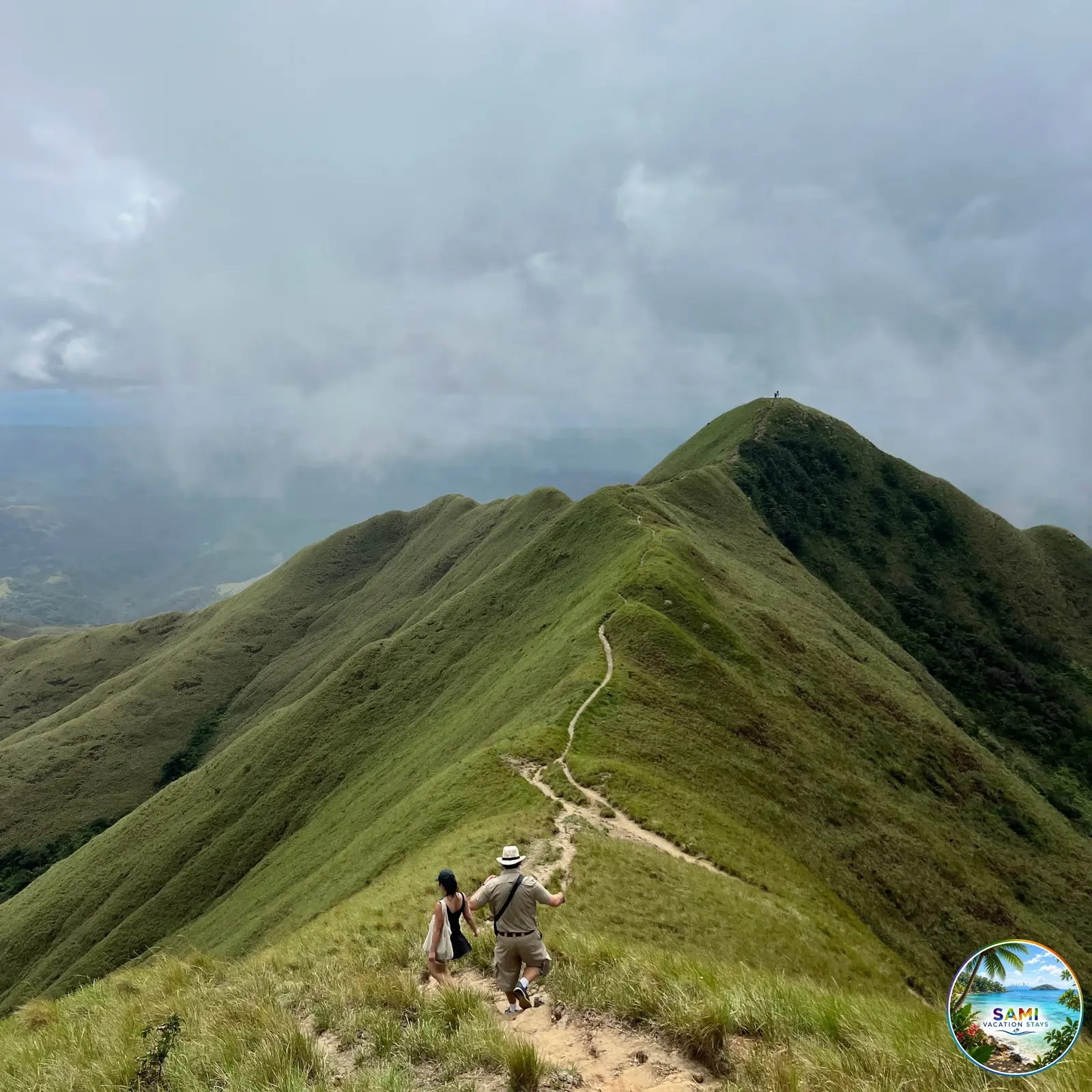Couple hiking along a mountain ridge